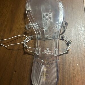 Gold Spiked Jelly slip on sandles. 
Brand new, never been worn.